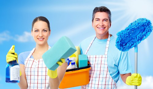 Cleaner reviewing service terms before starting a carpet cleaning job